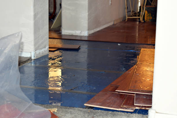 Professional Flood Damage Restoration technician working in Exeter, NH